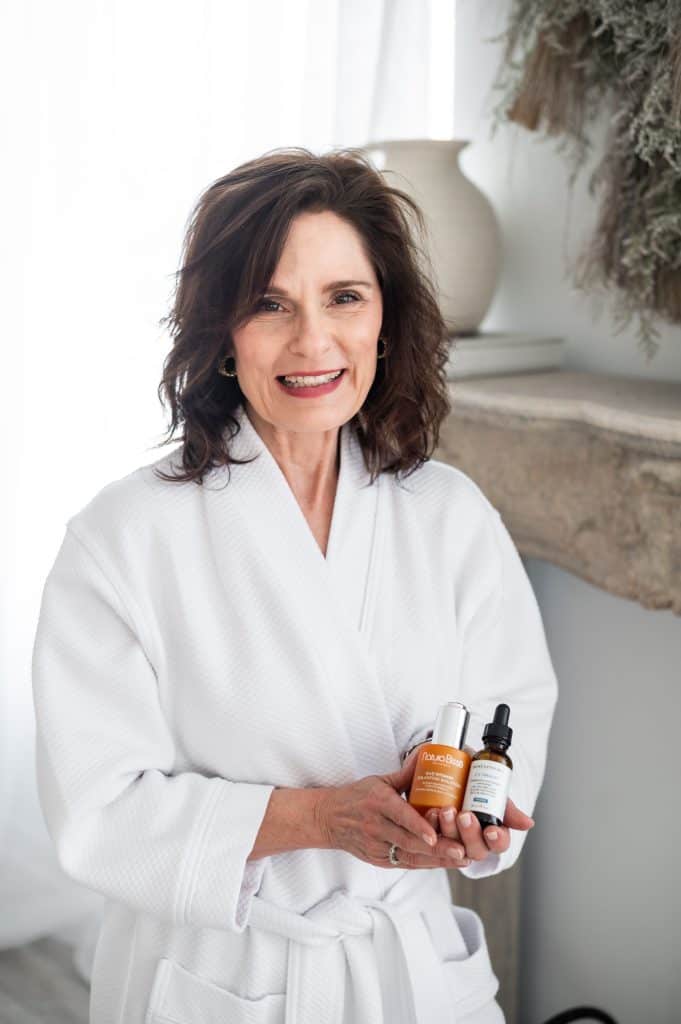 vitamin C Serum very selective skincare tester holidng vitamin C Serum she uses in her routine