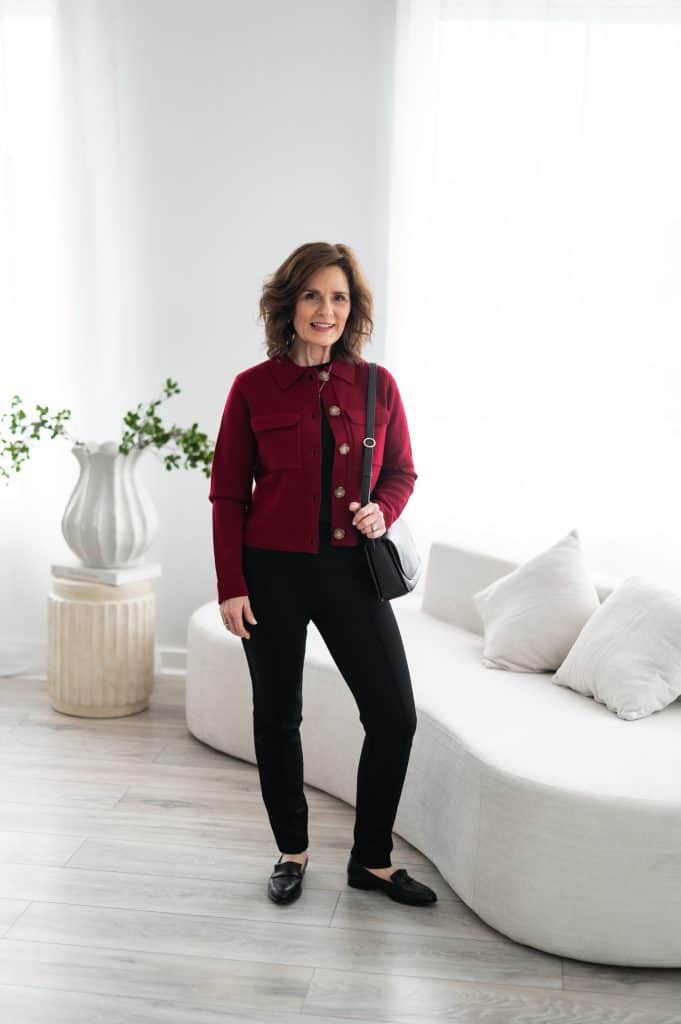 Polished but comfortable at-home outfit featuring a red sweater and skinny ponte pants on a petite woman.